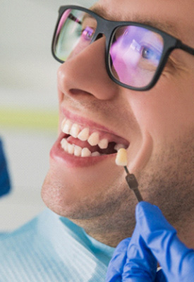 Replace missing teeth near Asbury Lake