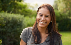 Woman smiling outside