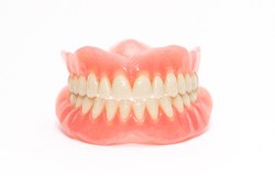 full denture against white background  