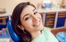 Smiling woman in dental chair