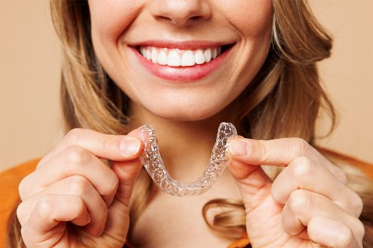 Get a straighter, more beautiful smile with Invisalign near Asbury Lake