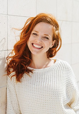 Woman smiling outside