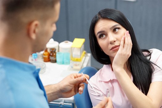 : A woman with a toothache