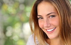 woman smiling outside