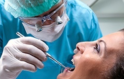 Woman receiving dental exam