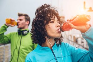 Woman drinking a sports drink