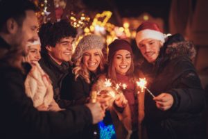 People smiling at holiday party