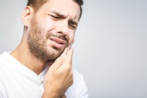 Man experiencing a toothache