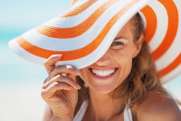 Woman smiling during the summertime.