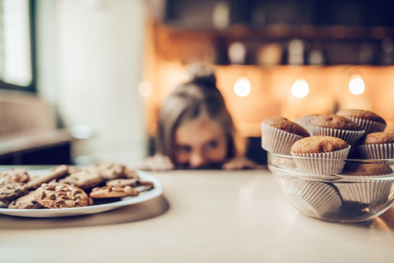 A woman trying to resist her sugar cravings