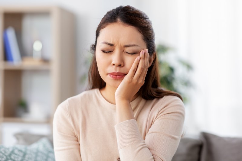 Woman with oral pain.