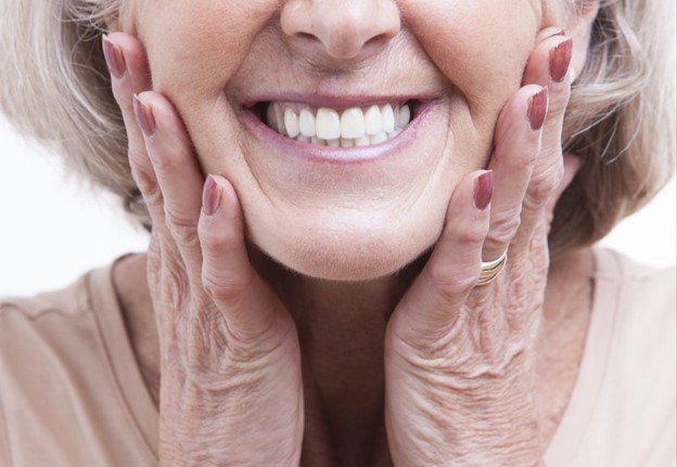 older woman wearing dentures