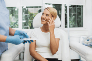 a patient smiling before receiving BOTOX